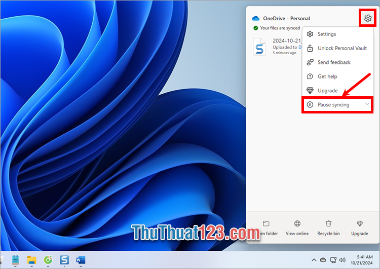Chọn biểu tượng bánh răng và chọn Pause Syncing